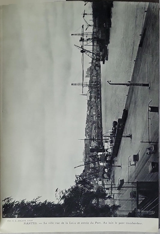 Ciels et Sourires de France: NANTES. – La ville vue de la Loire et entrée du Port. Au loin le pont transbordeur. By G. L. Arlaud