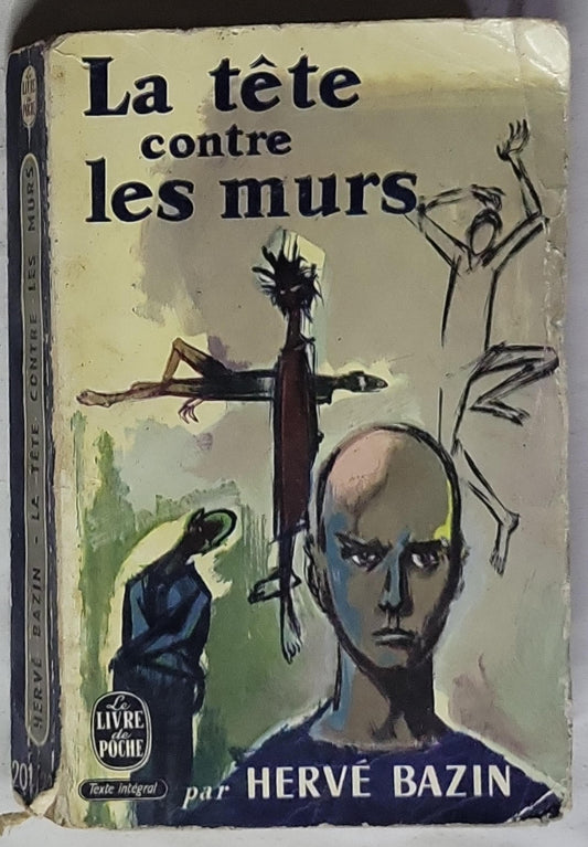 La tête contre les murs
